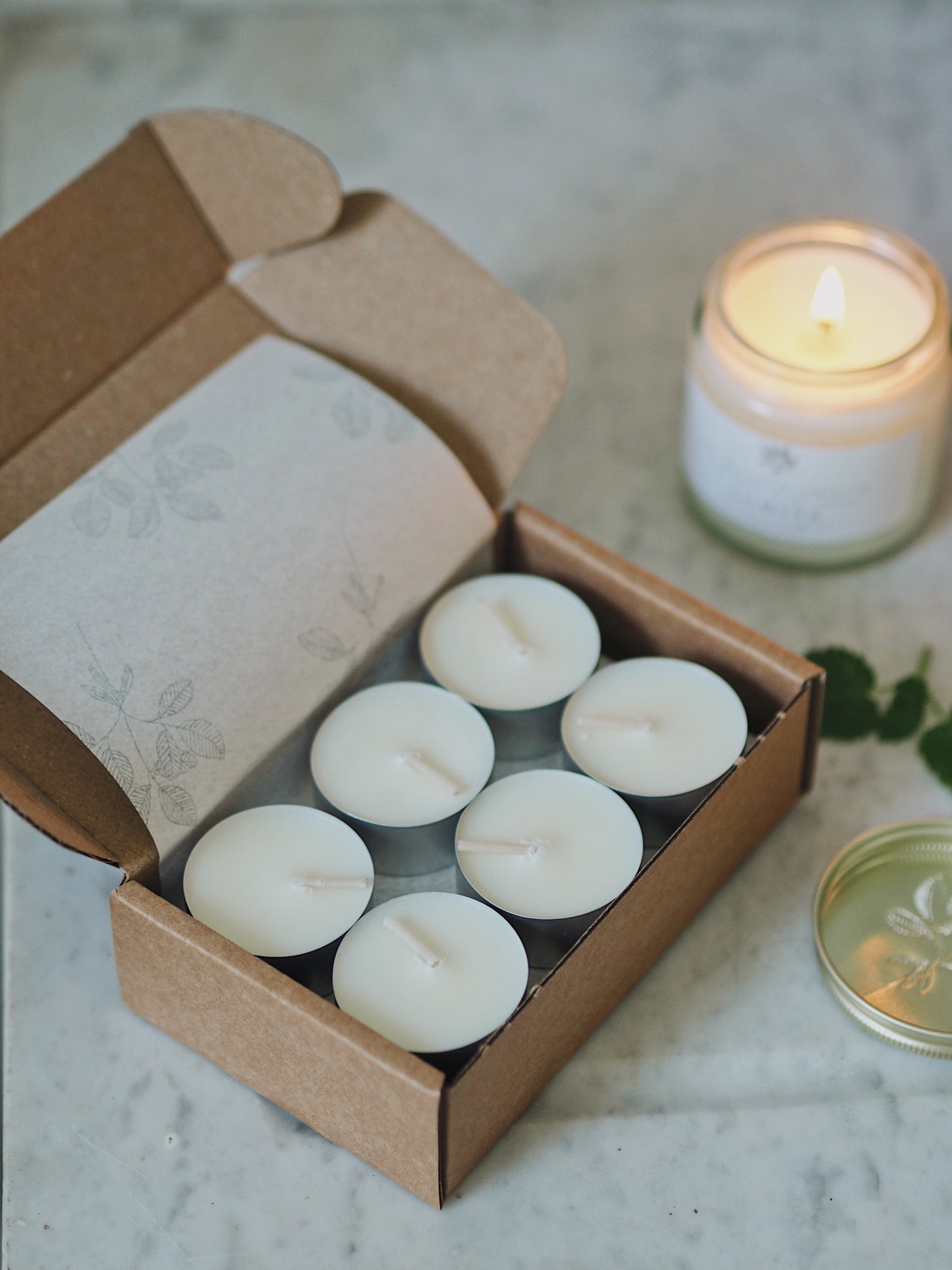 12  L U M I N E  Scented Soy Wax Tealights - The Botanical Candle Co.